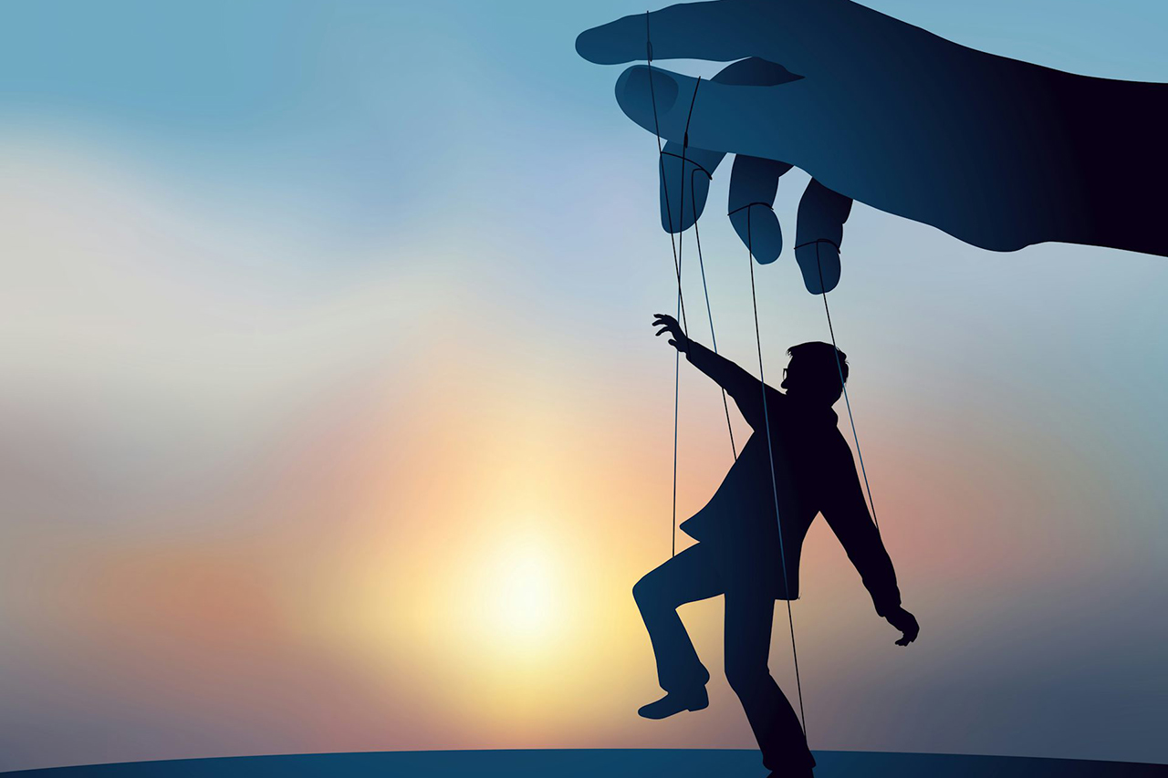 man being dangled as a puppet