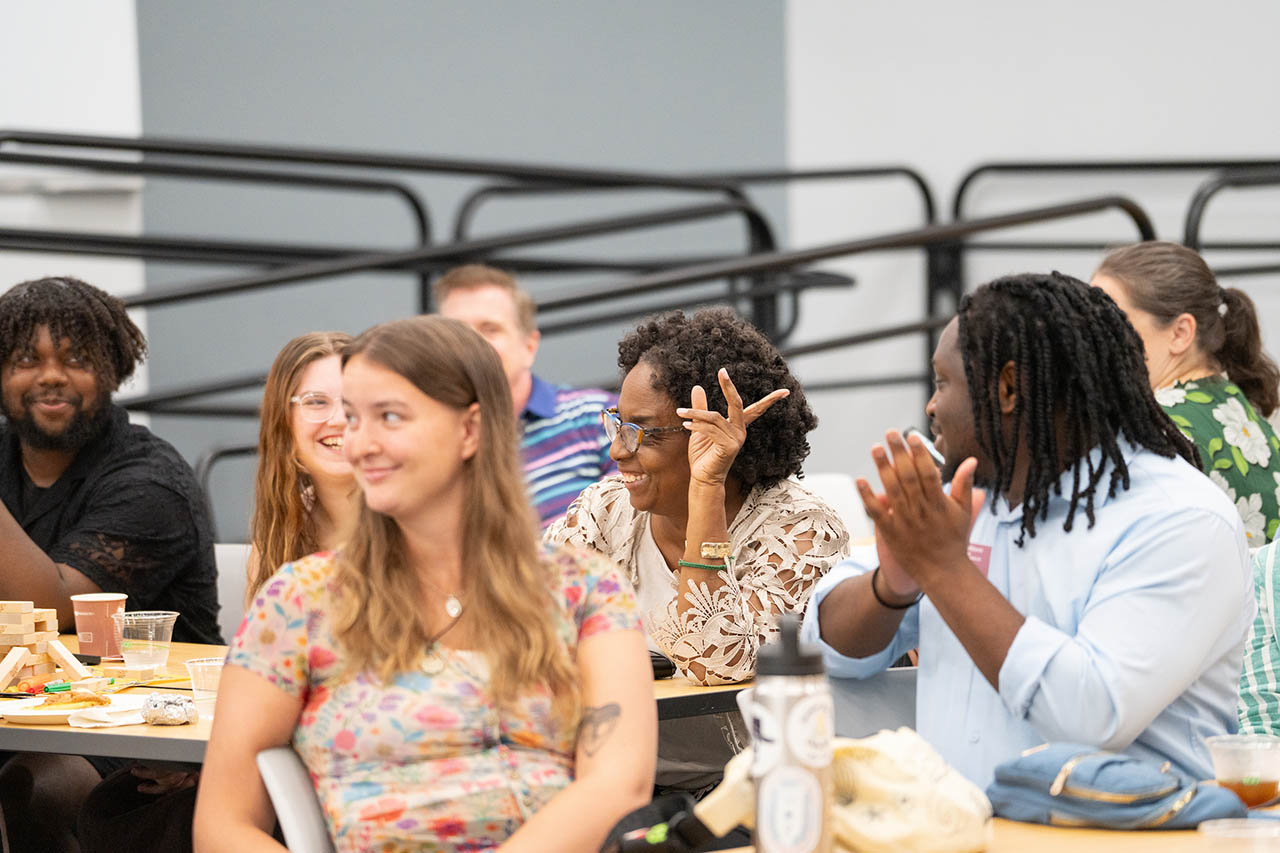 Student Affairs staff clapping