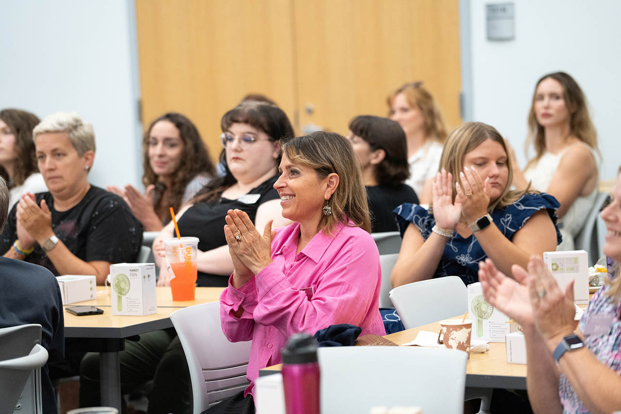 Student Affairs staff clapping