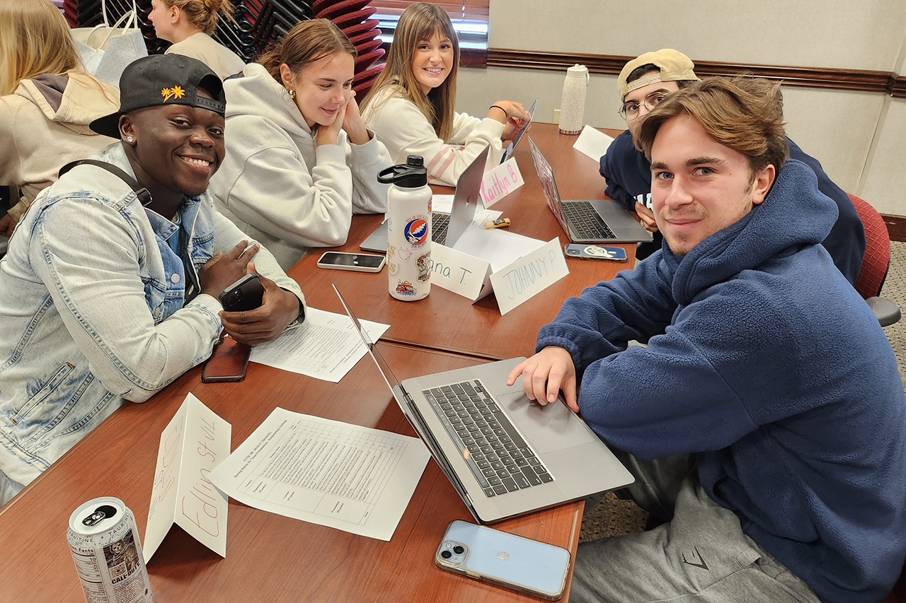 students sitting at table