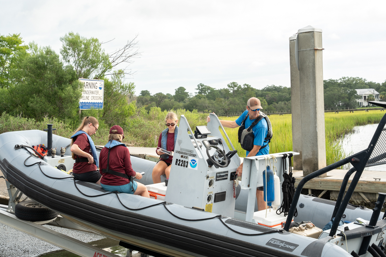 Leslie Hart, College Grad Students and the National Marine Mammal Foundation set out on the Charleston Harbor to research Dolphins. Permit No. 24359