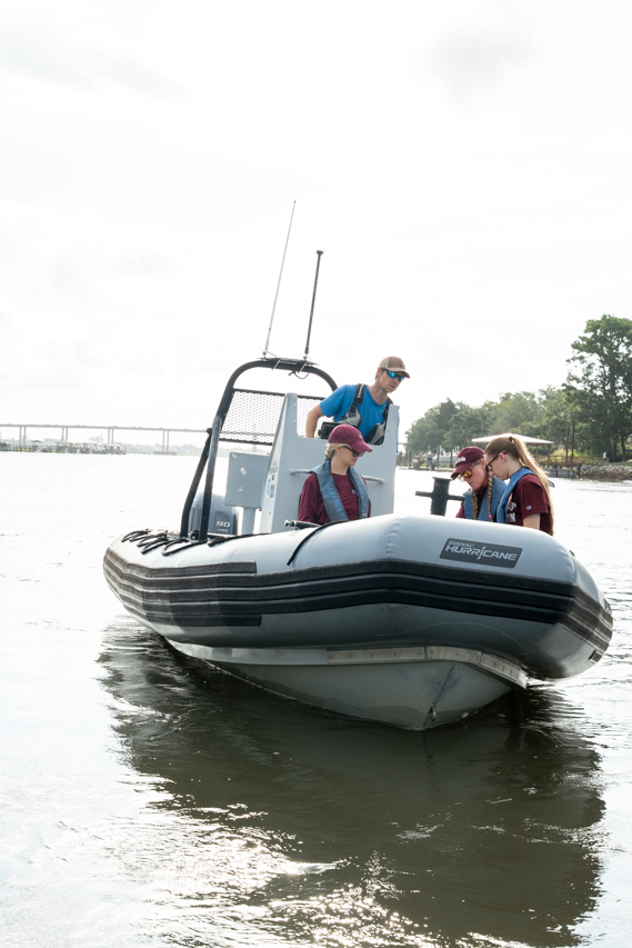 Leslie Hart, College Grad Students and the National Marine Mammal Foundation set out on the Charleston Harbor to research Dolphins. Permit No. 24359