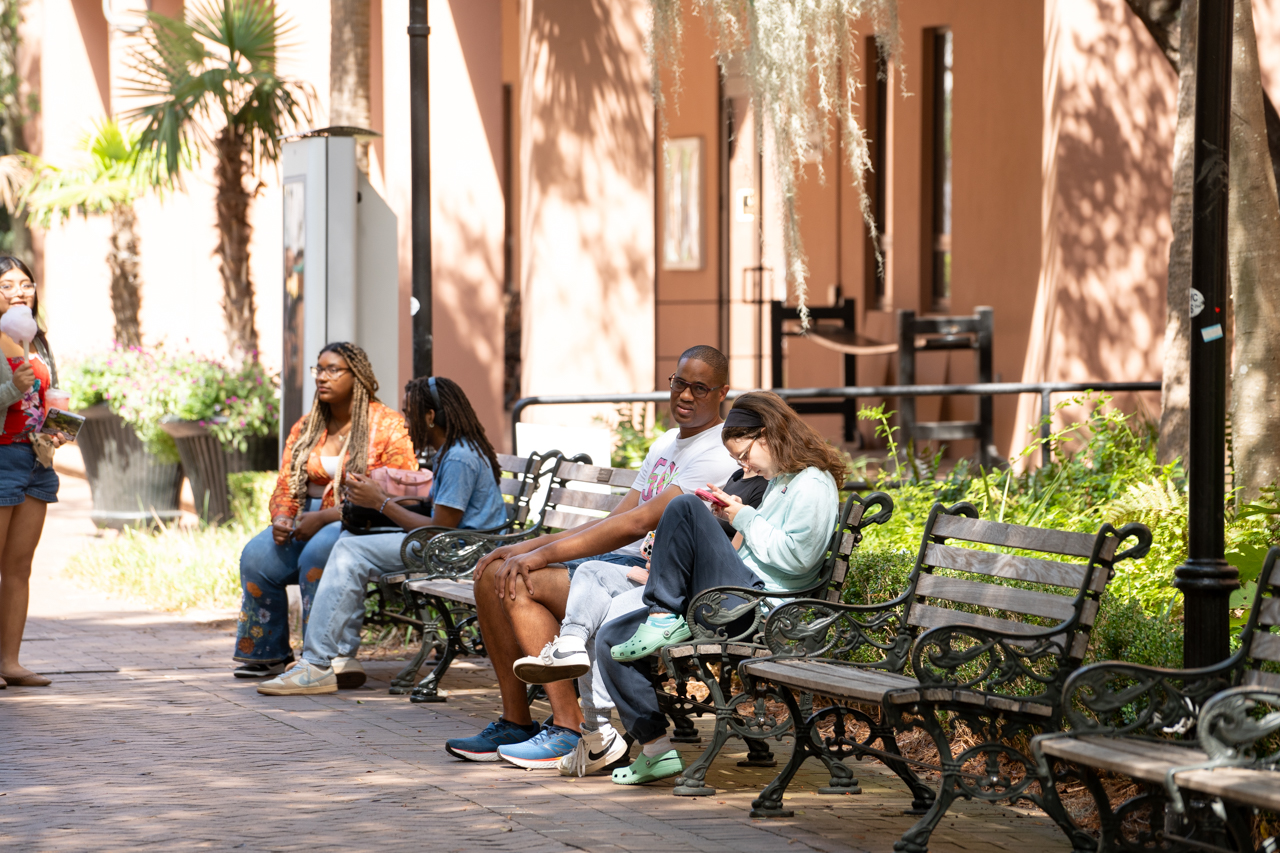 sitting with friends in the Cougar Mall