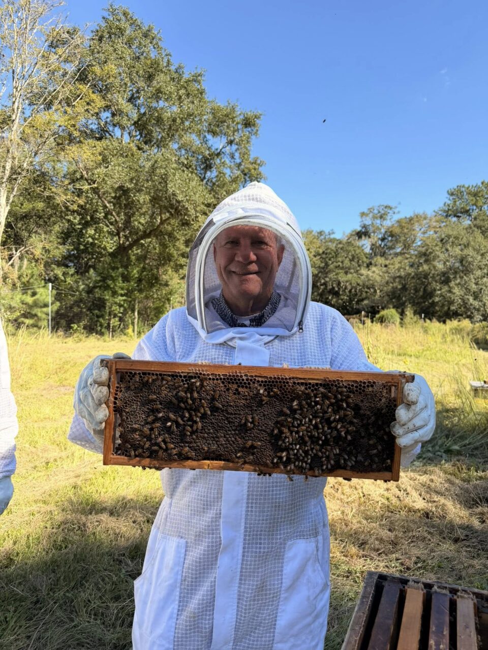 College of Charleston Board of Trustees members joined the Environmental and Sustainability Studies Program at Stono Preserve Student Garden for an immersive beekeeping experience! They suited up, stepped out of their comfort zones, and learned all about hive management, the College’s Sustainable Agriculture Program, and the incredible impact this work has on our students and community.