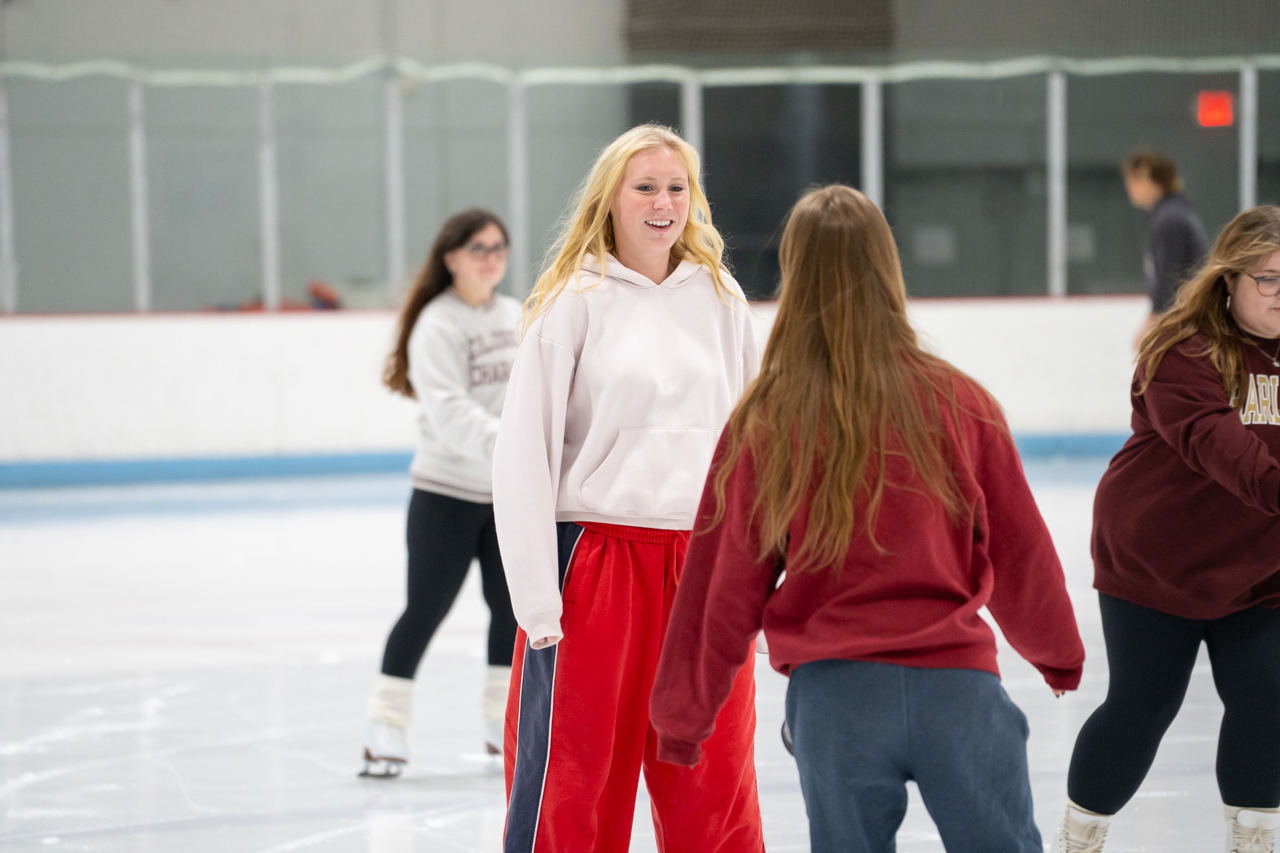 friends ice skating together 