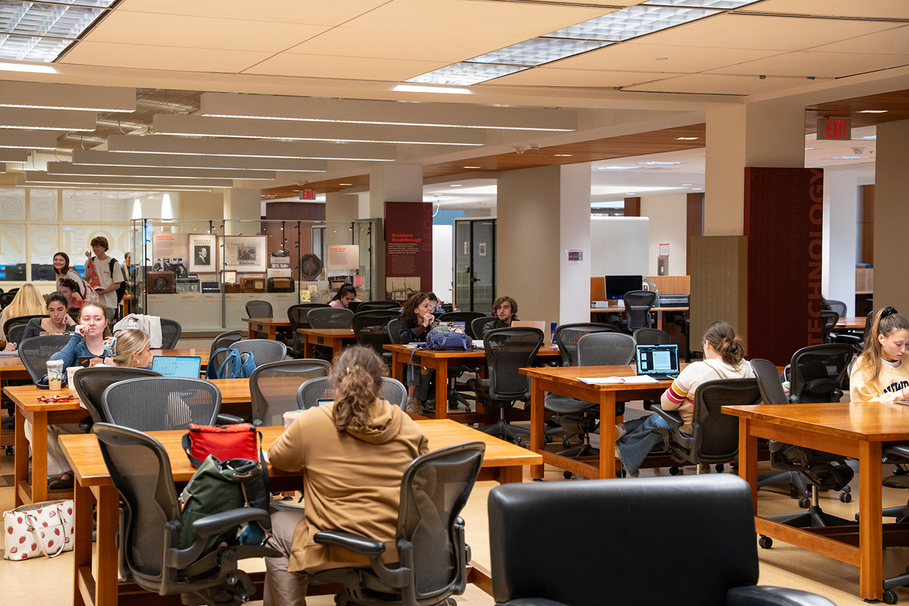 Students studying in the library for finals