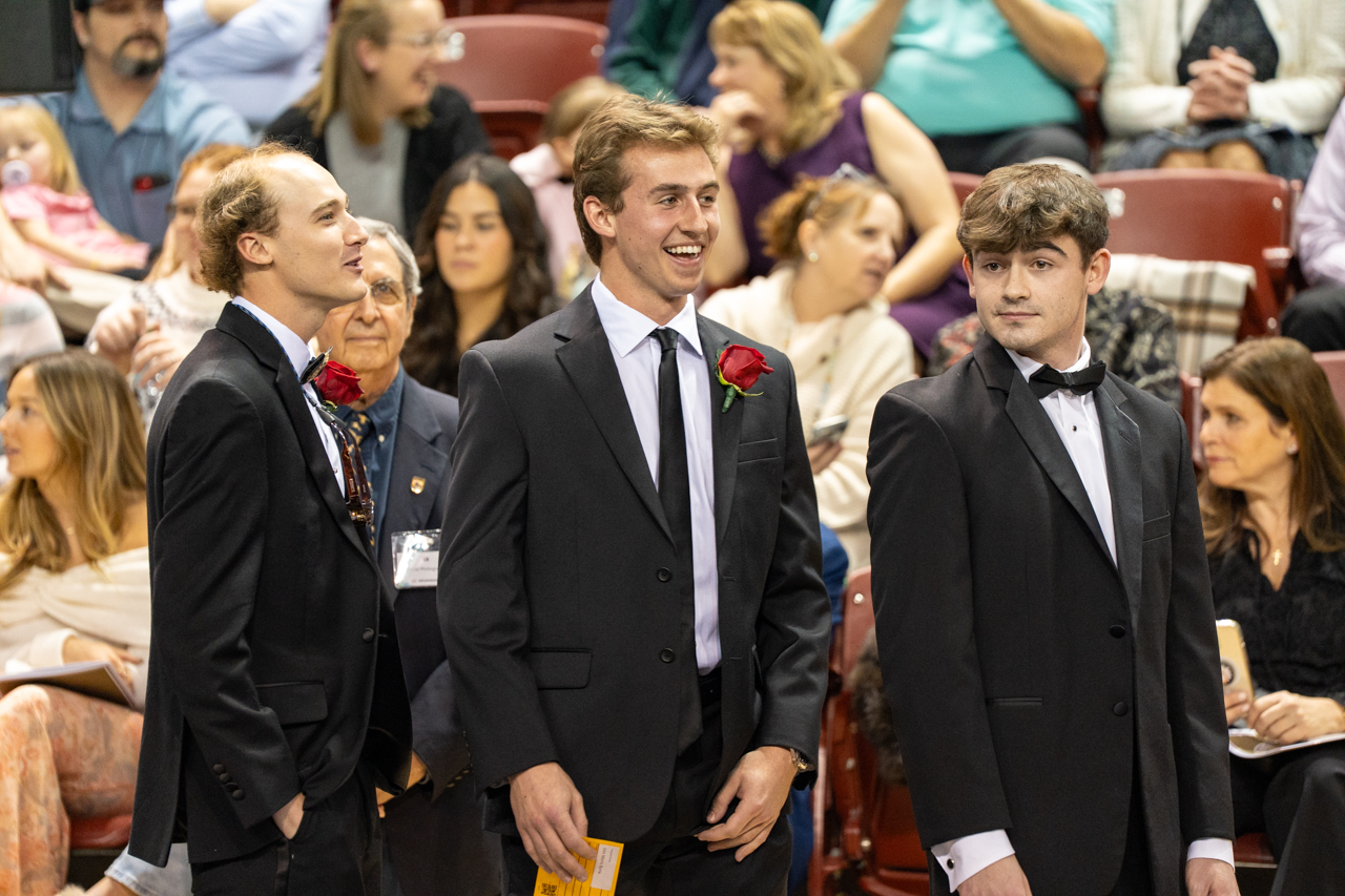 graduated feel joy while waiting to be seated for commencement