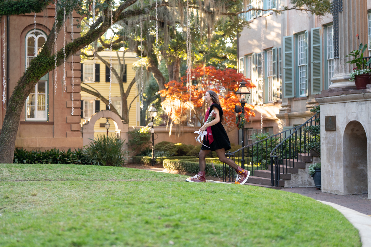 Girl Clyde walks the Cistern in her Clyde the Cougar sneakers 