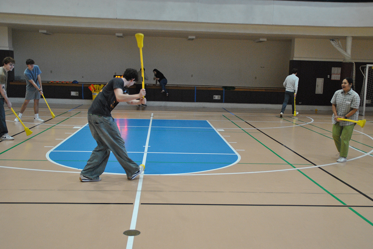 playing Broomball in the gym