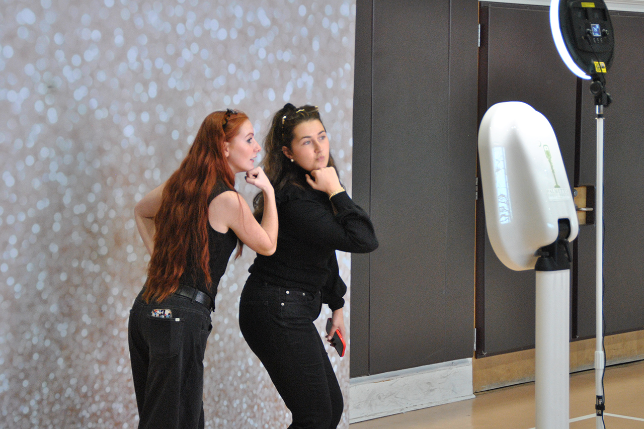 taking selfies with friends 