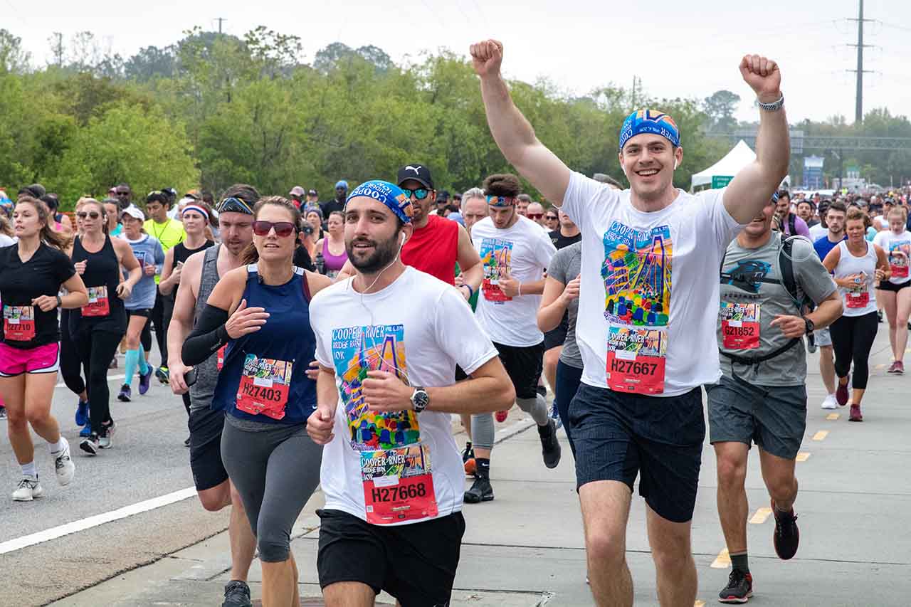 people with race numbers running