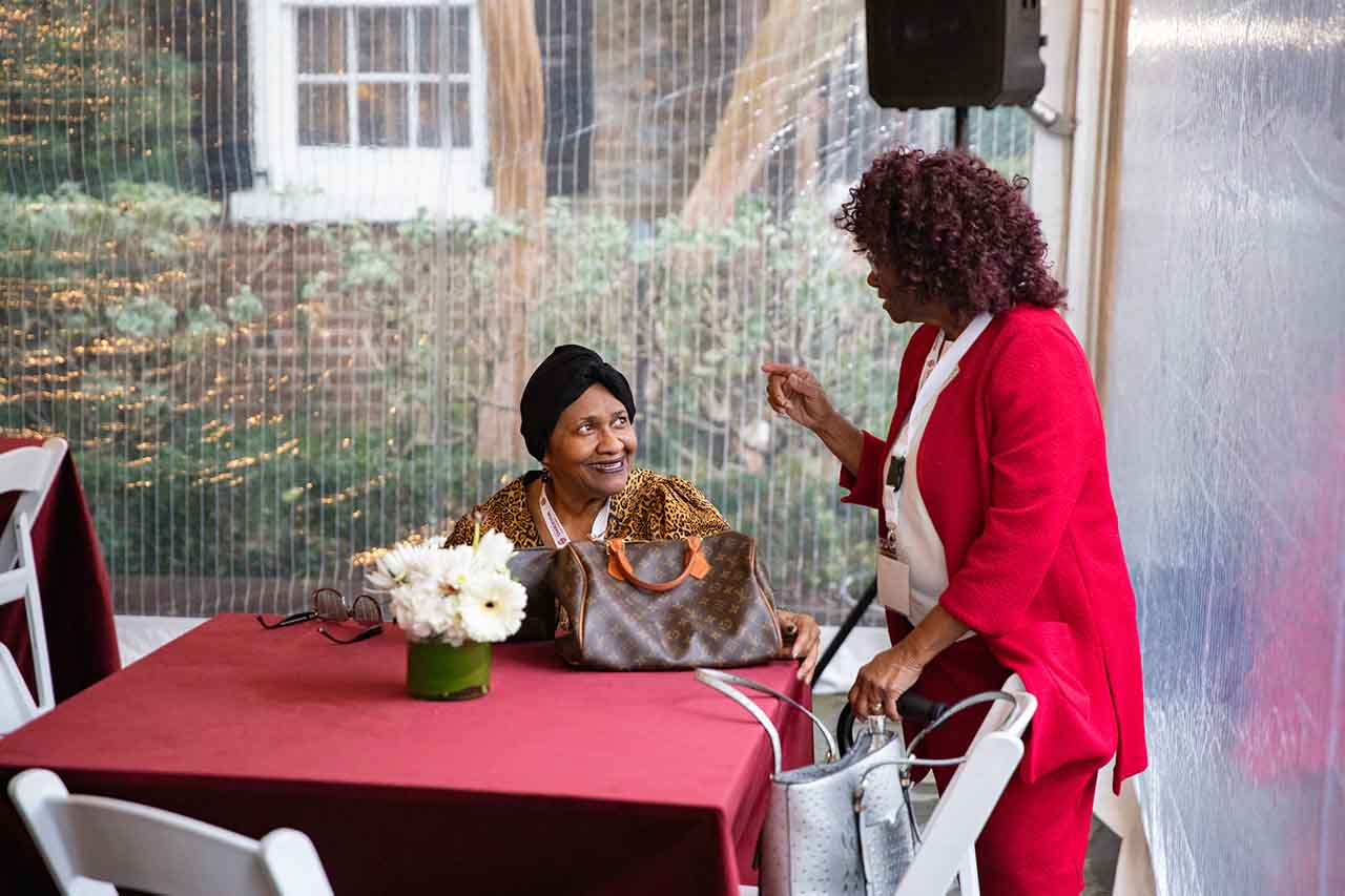 two women talking to each other