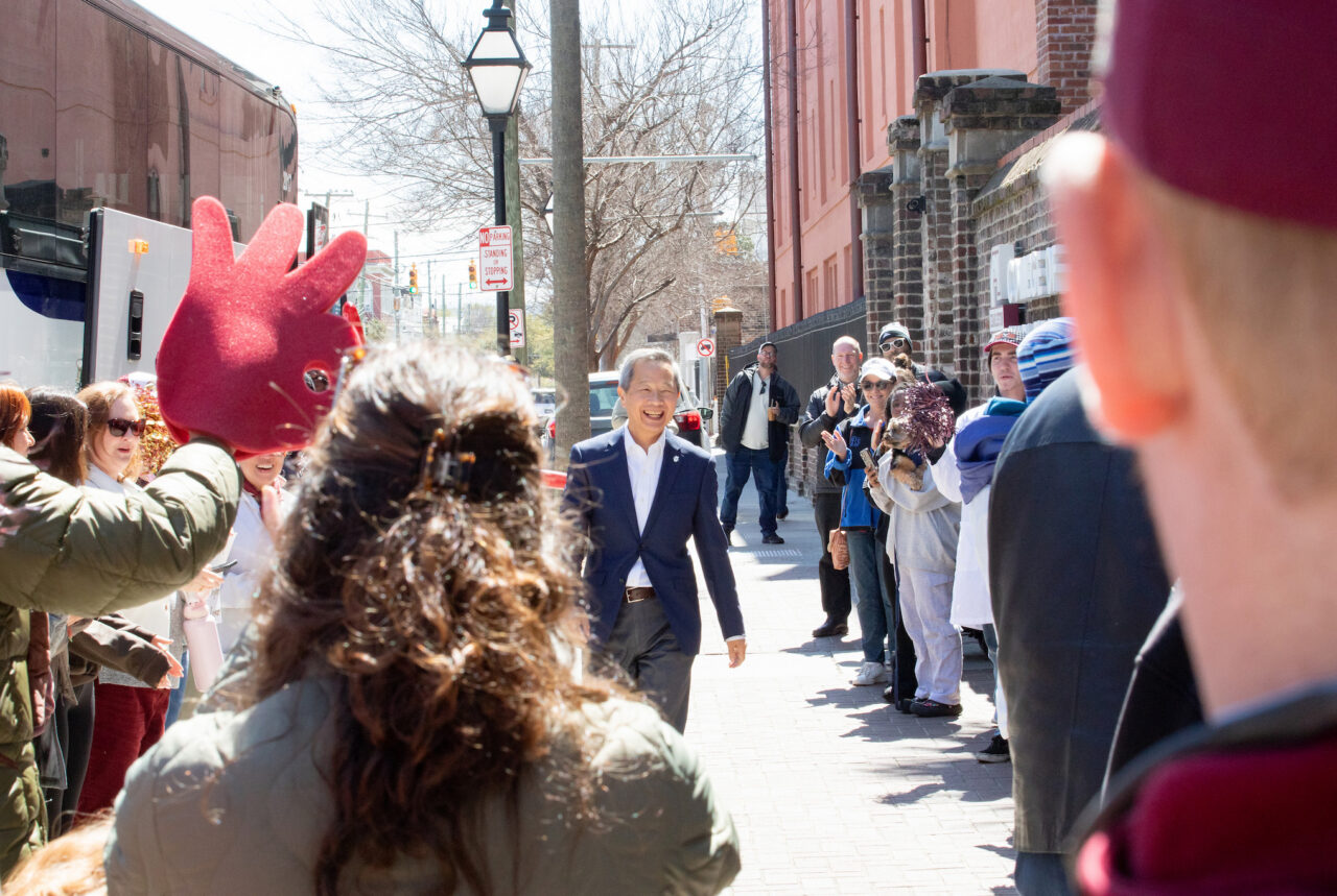 president Hsu walks outside TD Arena