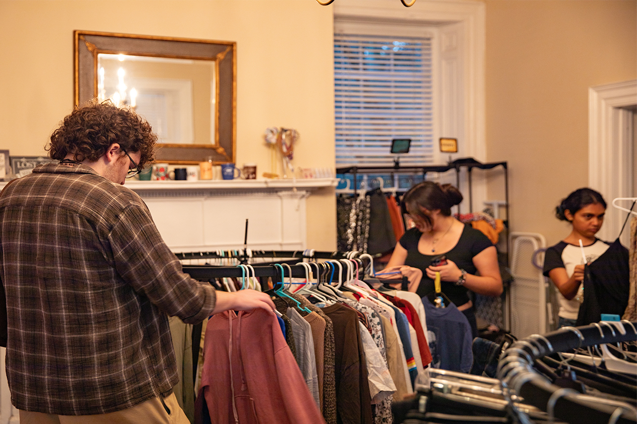 people shopping for clothes
