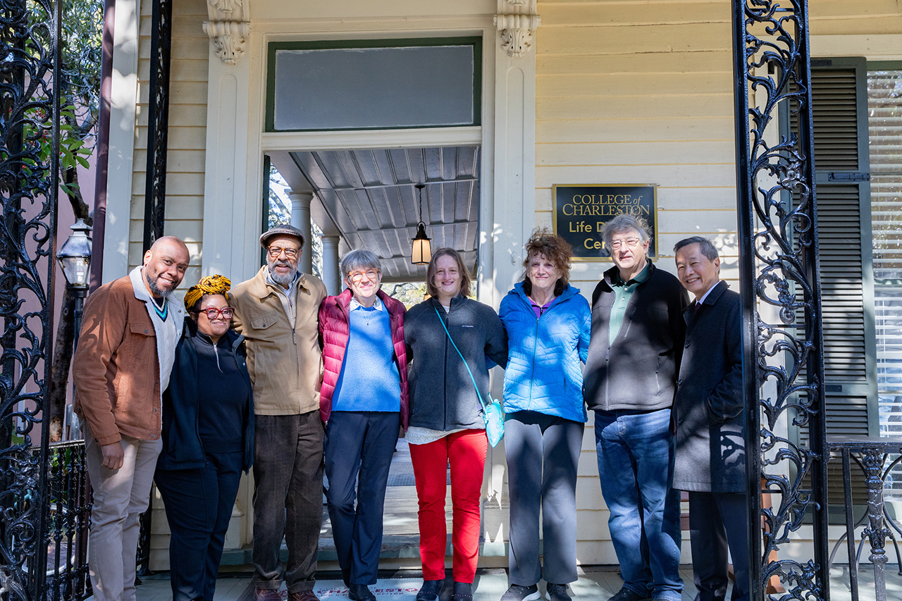 Group photo outside the 14 Greenway house.