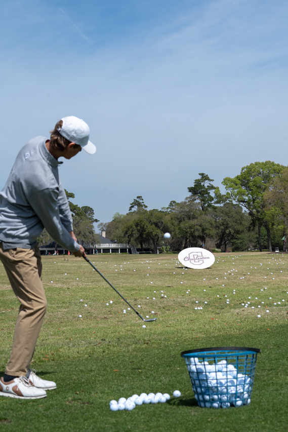 ball flies in the air from chip shot