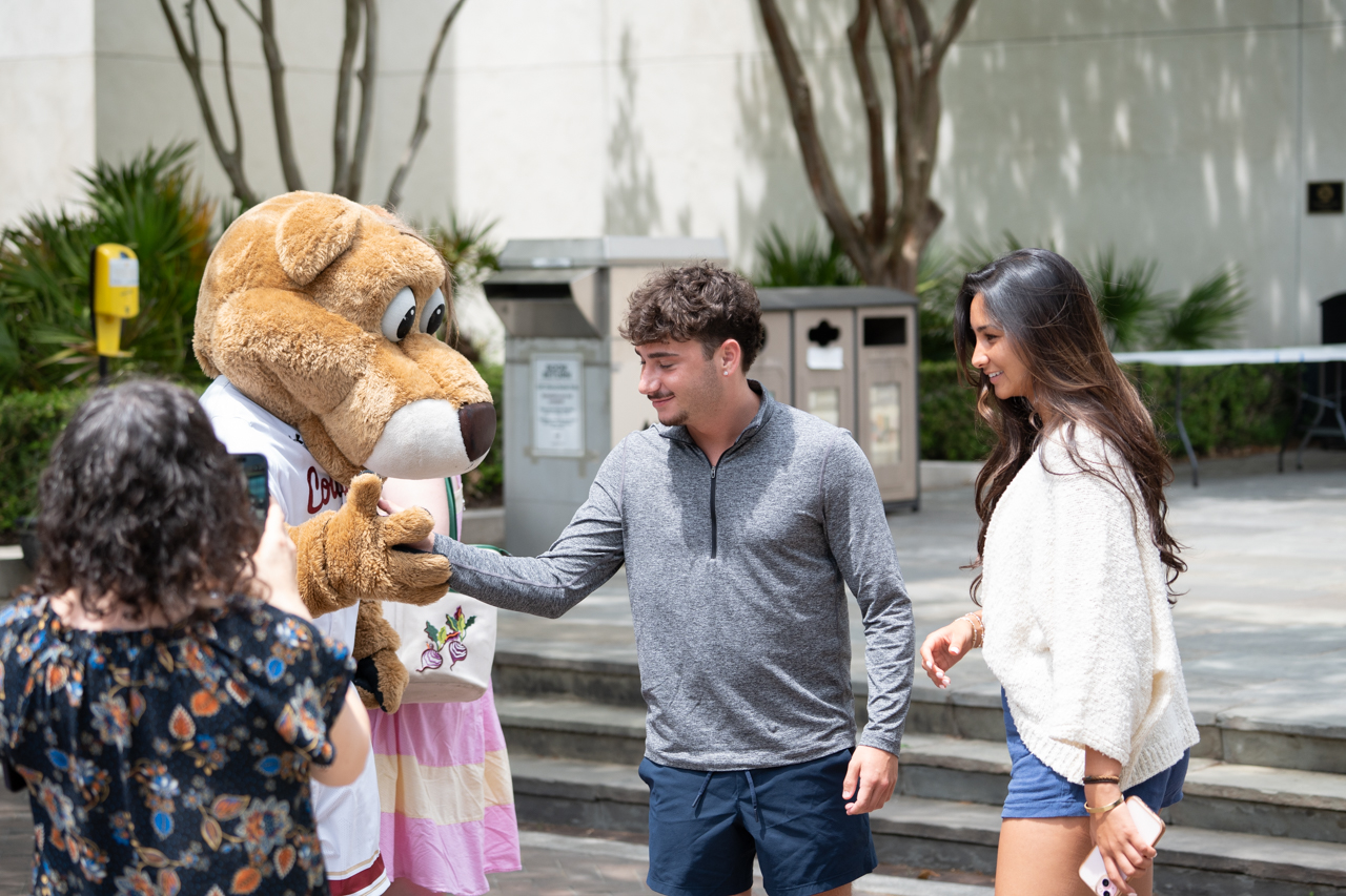 student high fives Clyde