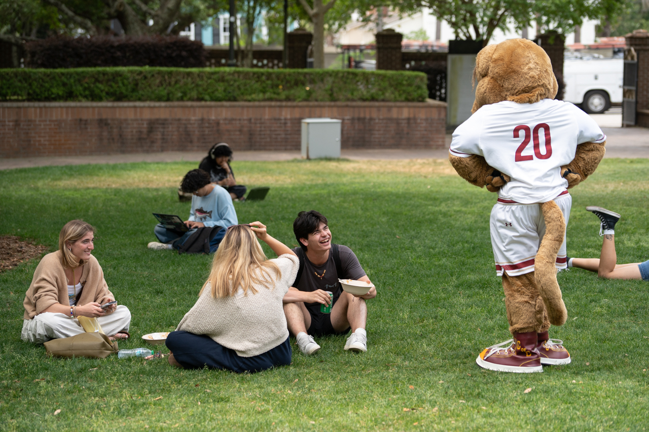 students talk to Clyde on Rivers Green