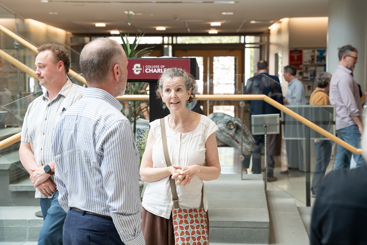 faculty speaks to another