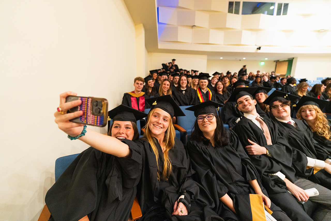 graduate school grads before ceremony