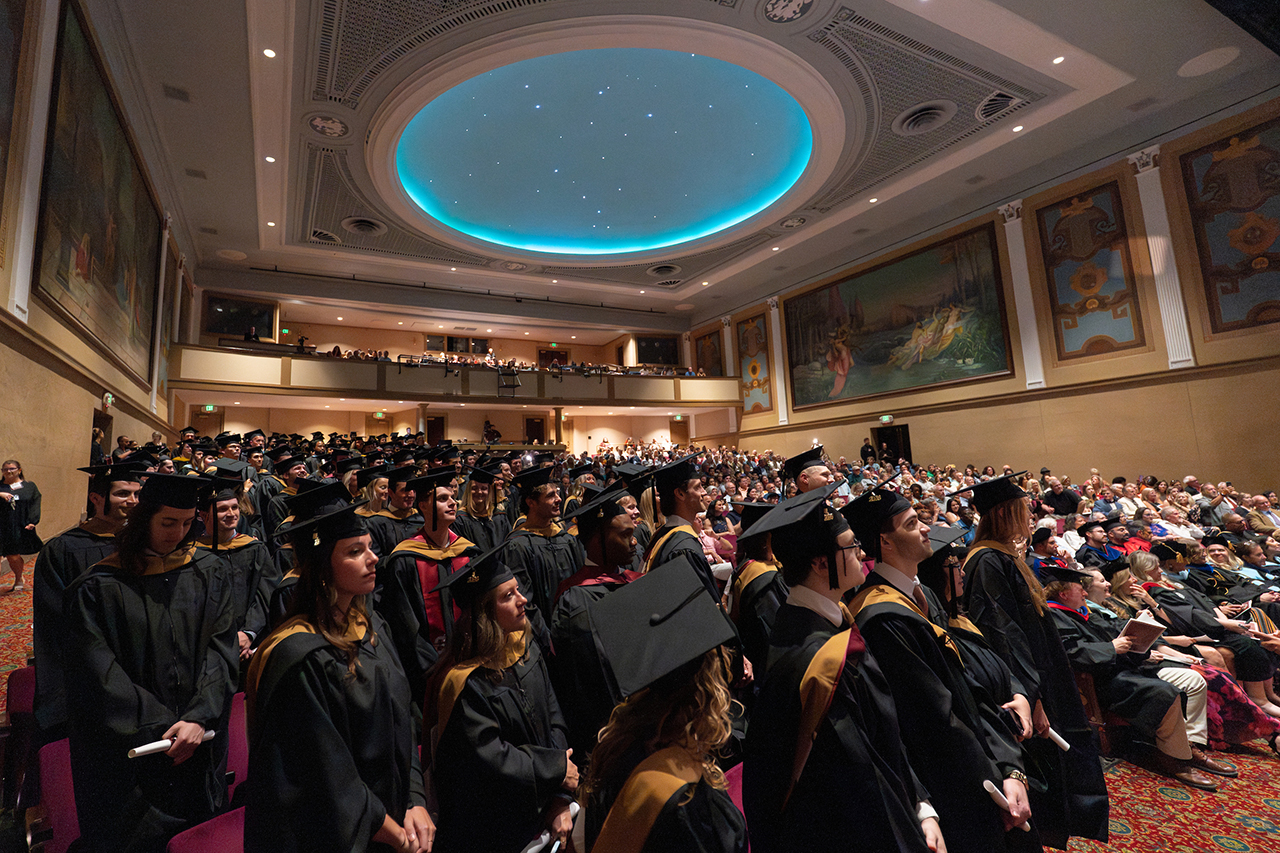 graduate school students at commencement