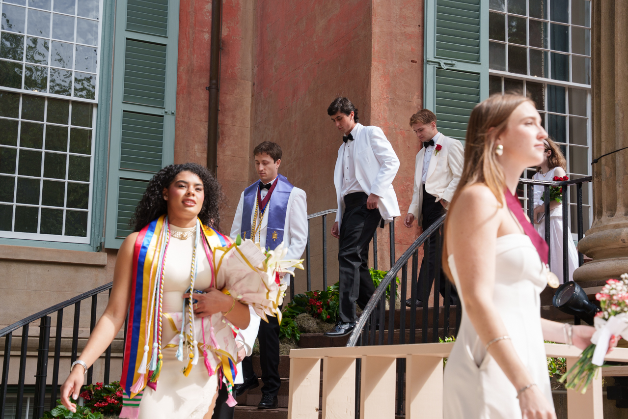 students walking down Randolph hall steps