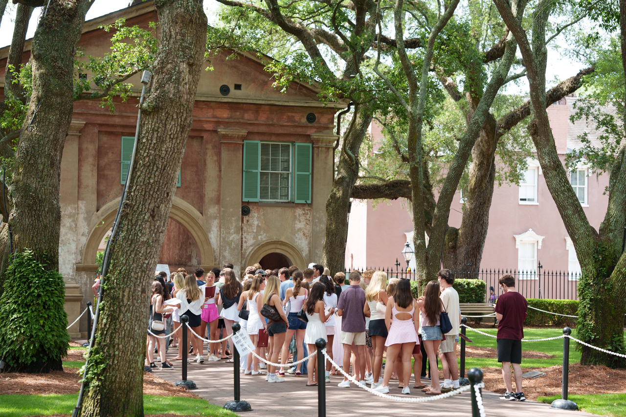 A group of New Student gather in front of Porters Lodge for Orientation