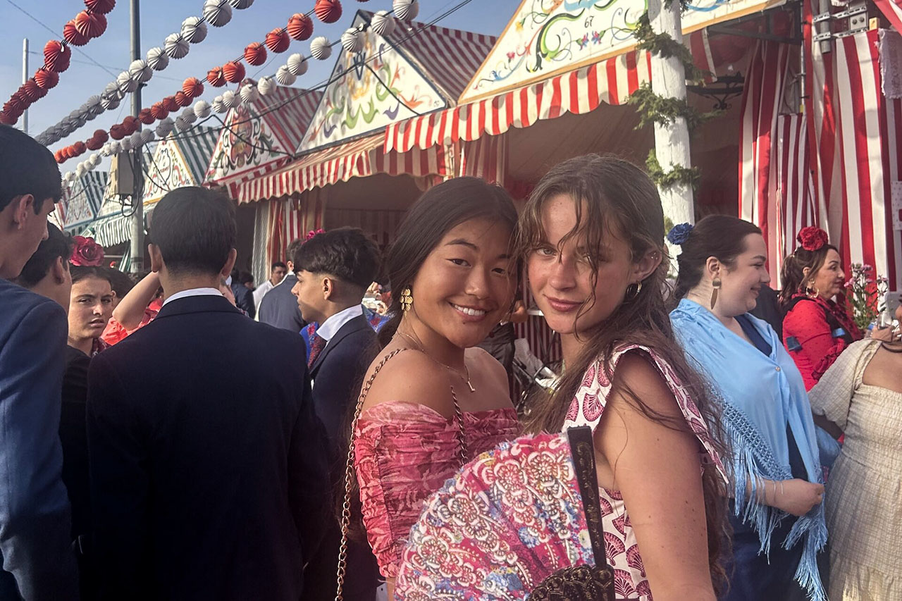 Lali Bagwell (left) with a friend at the Feria de Abril in Seville, Spain