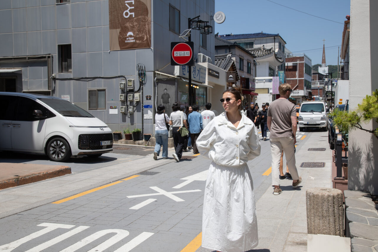 Student poses on South Korea Street