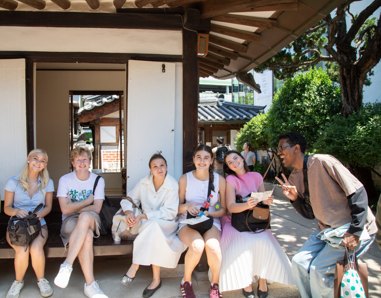 students gather outside of historical area in South Korea