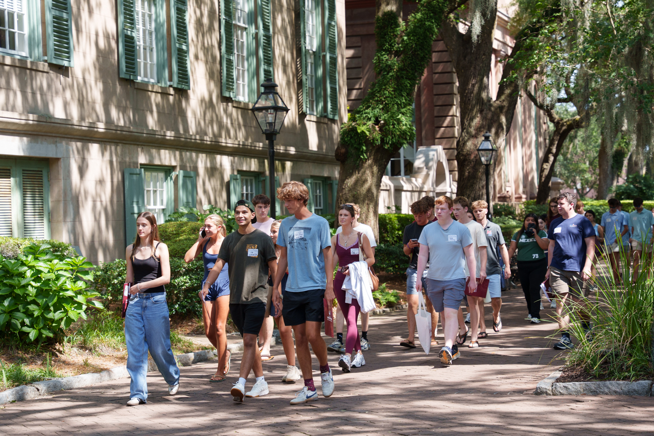 Students walk together through campus