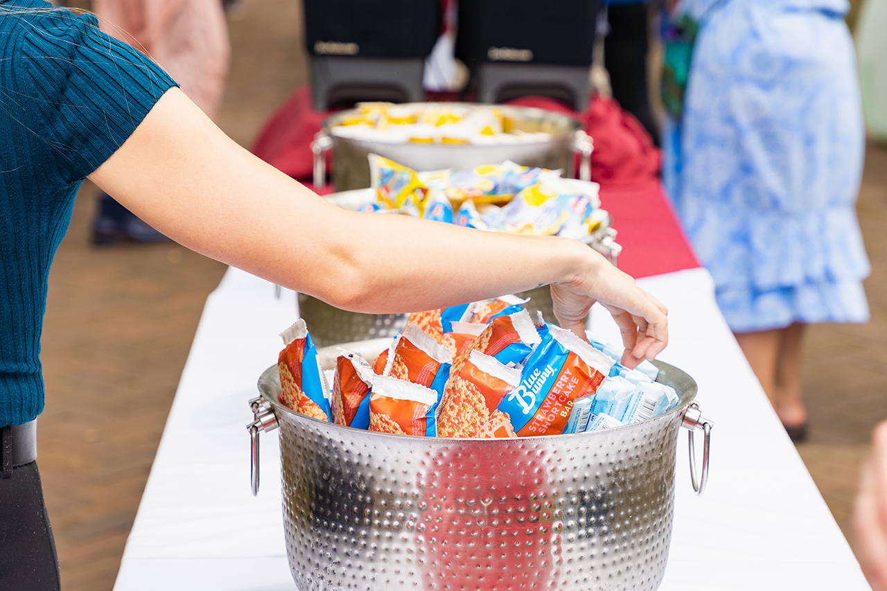 buckets of ice cream bars on a table