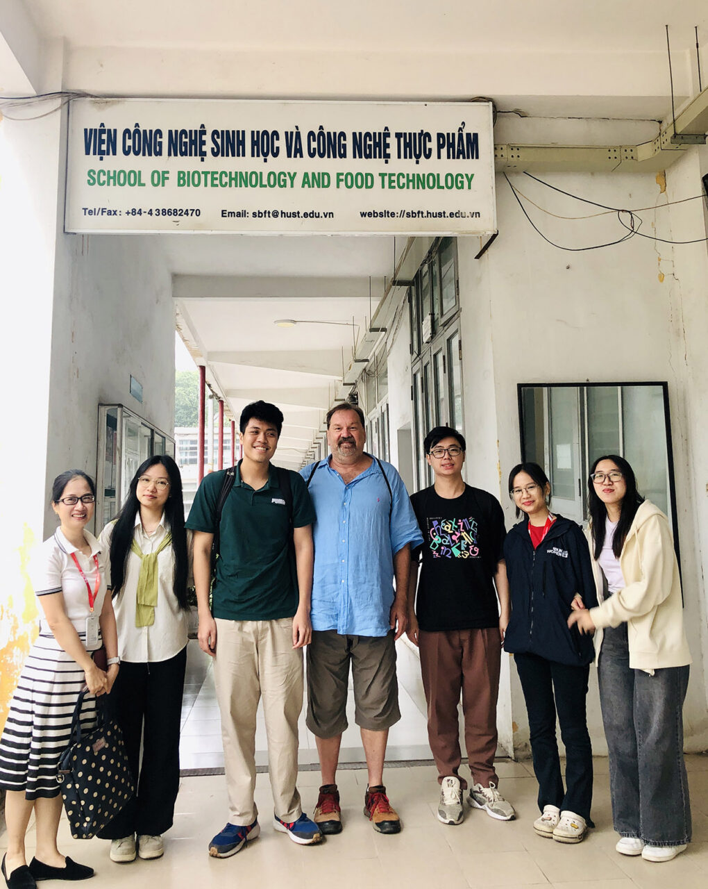 Professor Shedlock standing with award-winning graduate students and postdoctoral researchers in the School of Biotechnology and Food Science at the Hanoi University of Science and Technology, Hanoi, Vietnam, during his 2025 College of Charleston sabbatical based at the Department of Biological Sciences, Graduate School of Bioscience and Biotechnology, Institute of Science Tokyo, Japan.